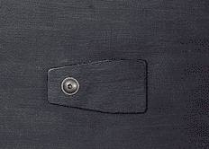 Detail spouště dírkové komory.
